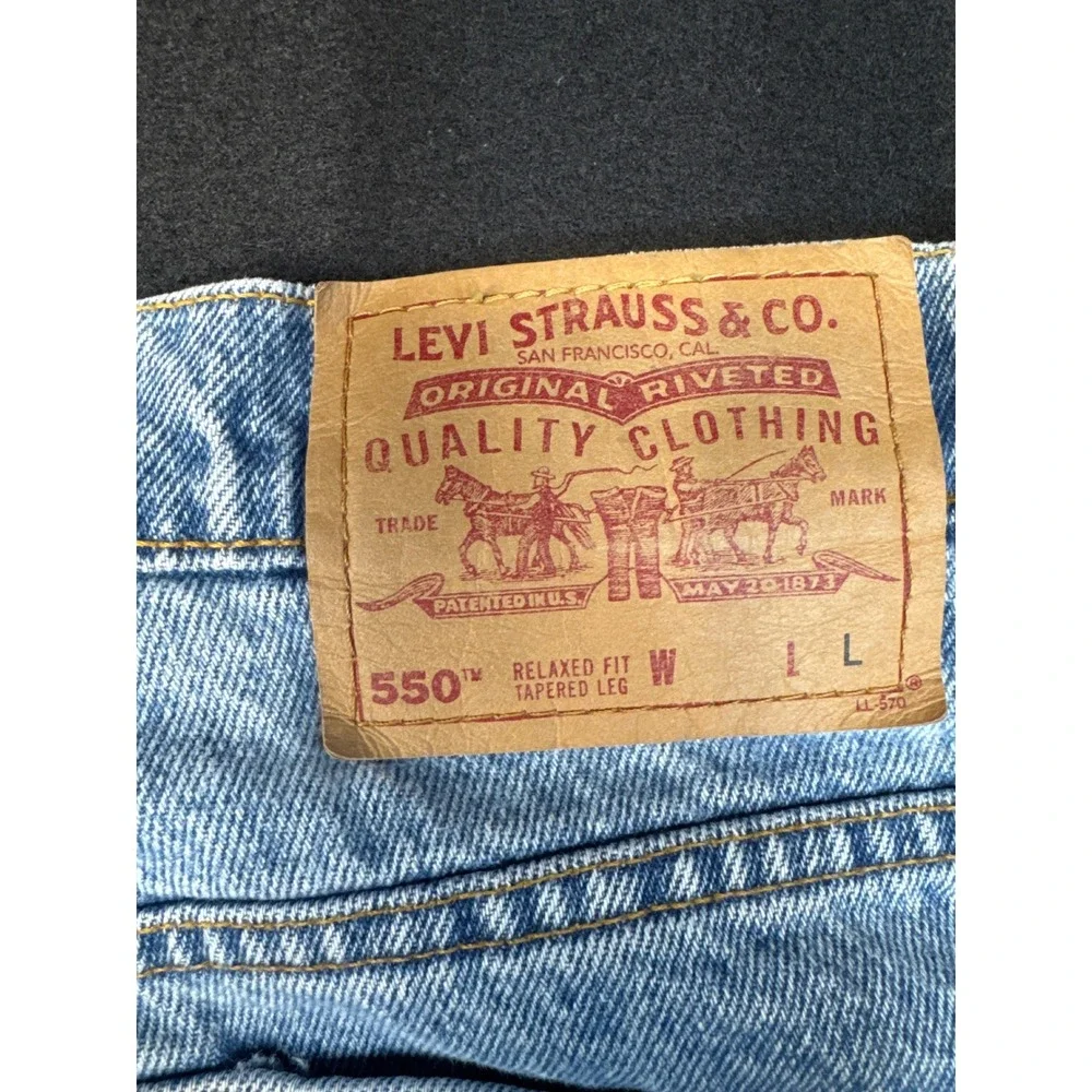 Levis 550 Relaxed Fit Tapered Leg Jeans Light Wash Denim Vintage Mens 31x31